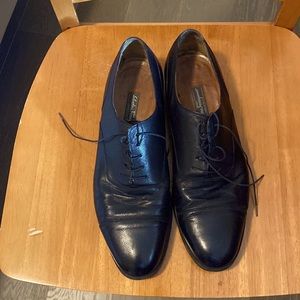 Beautiful Black Ferragamo dress and casual shoes.  Sharp and well maintained.